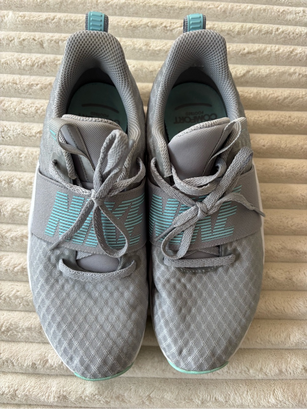 Nike Women's Light Gray Athletic Sneakers with Teal Accents